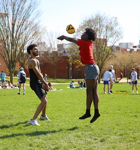Students play volleyball on the Quad at Commonwealth University-Bloomsburg, formerly Bloomsburg University.