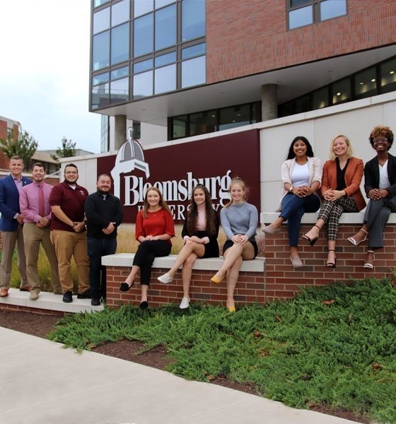 CGA Representatives in front of David L. Soltz Hall