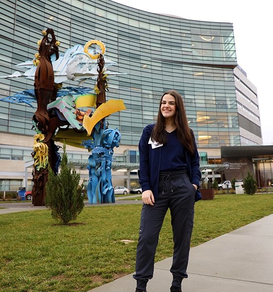 SLP graduate students smiles at her externship at Milton S. Hershey Children's Hospital.