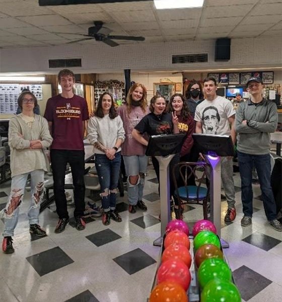 Students from Mathematics Club pose at bowling alley.