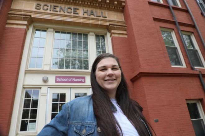 MSN Nurse Practitioner student in front of Old Science Hall