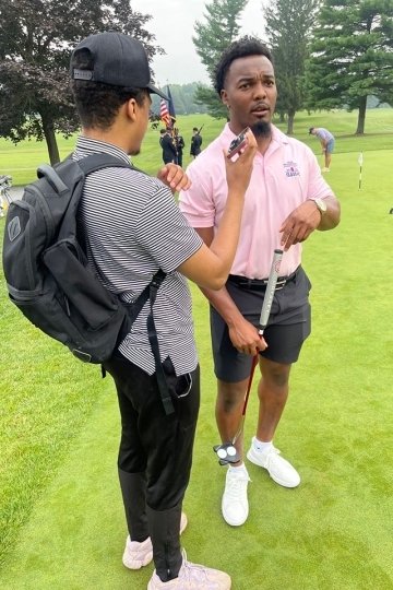 Two men on a field. 