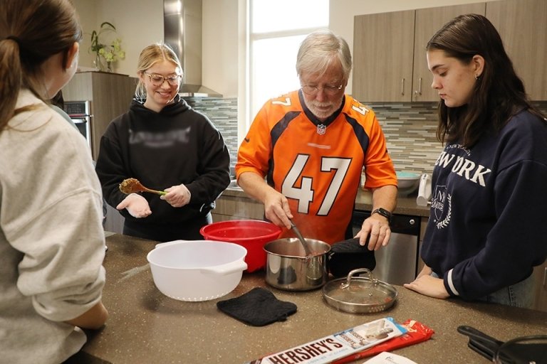 People cooking together. 