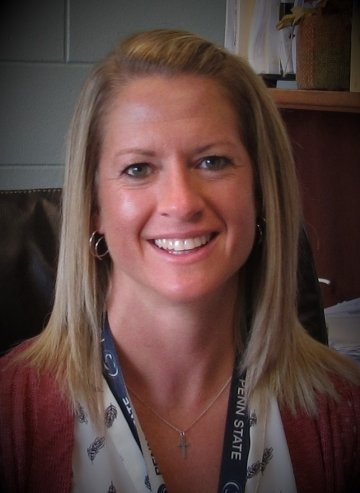 A headshot of a woman.