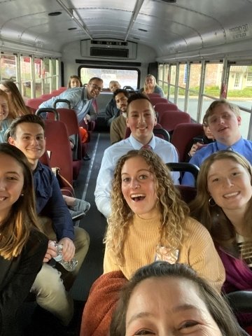 A group on a bus. 