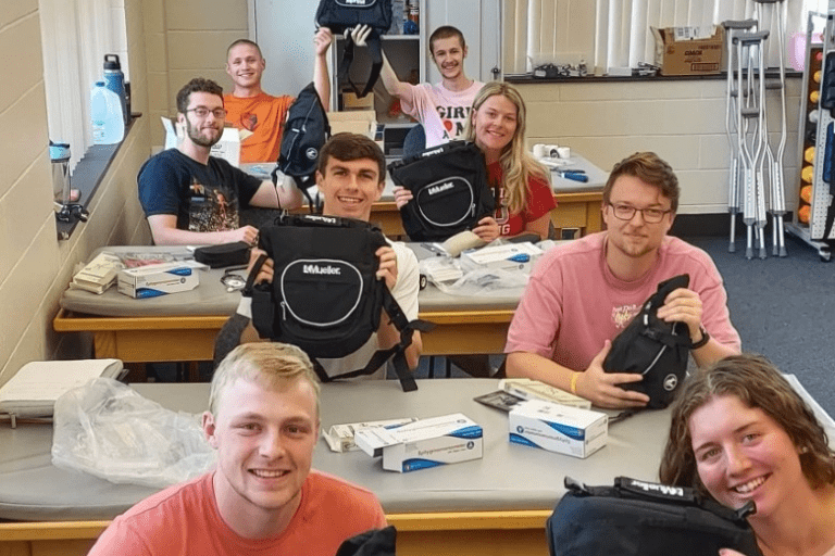 M.S. Athletic Training Students presenting funded bags