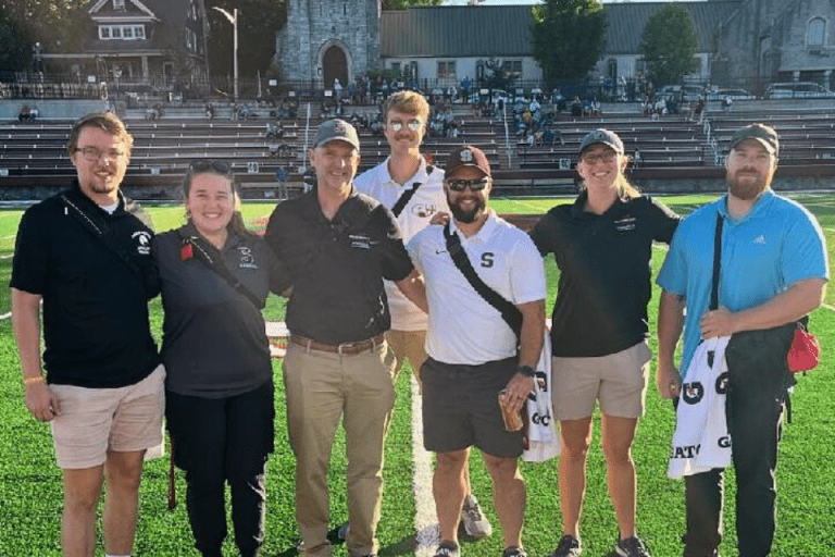 M.S Athletic Training Students take picture on CU-Lock Haven field