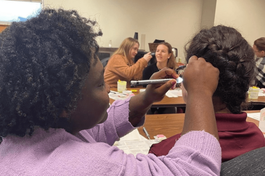 Audiology students working on creating earmolds