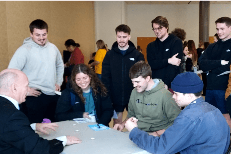 M.S Athletic Training Students at a table