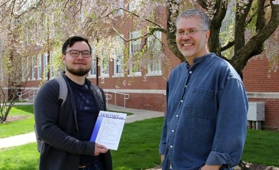 James Sharpe and professor posing for a photo