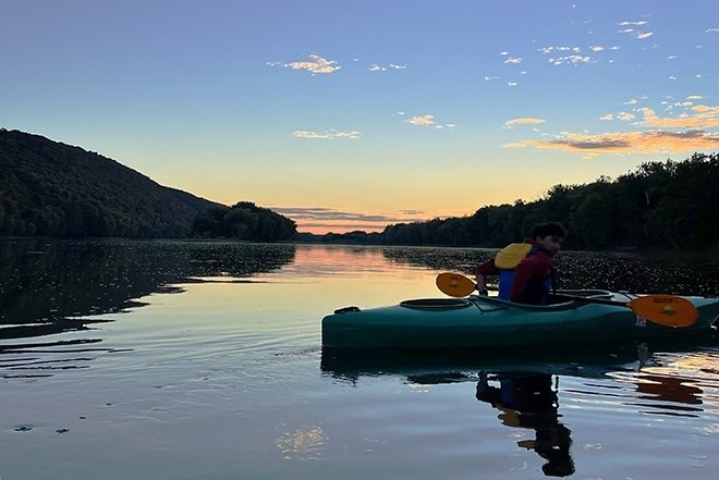 Quest student sunset kayaking