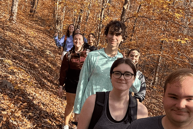 Quest students hiking.