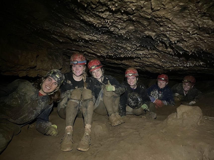 Quest students in cave