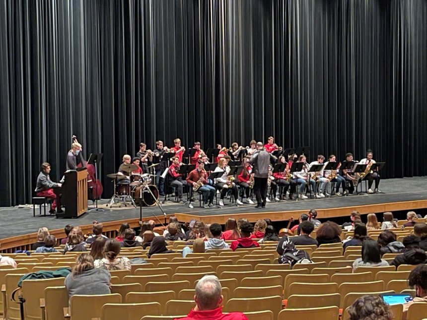 A group performing on stage. 