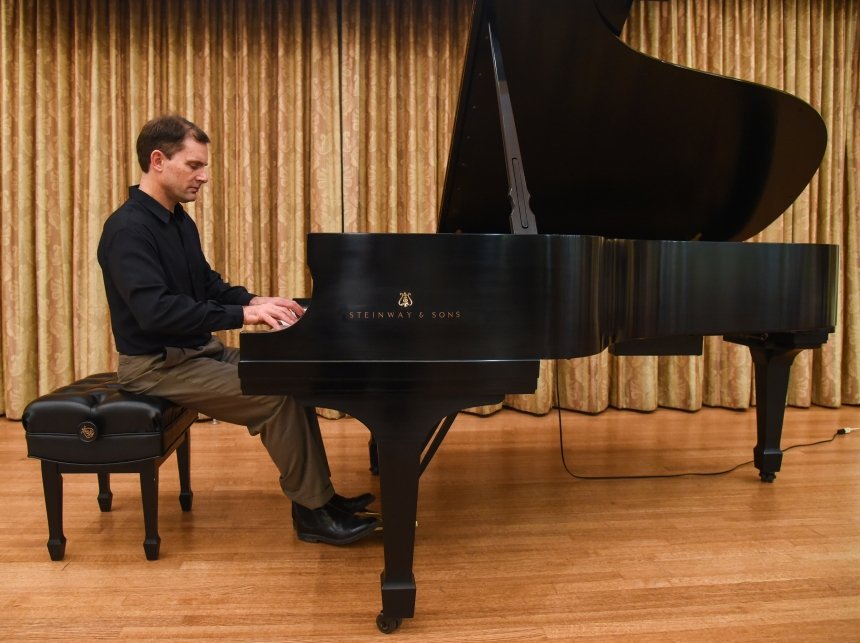 A man playing piano. 